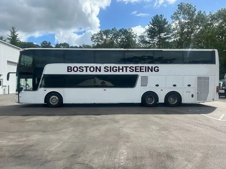 A white Boston Sightseeing double-decker coach